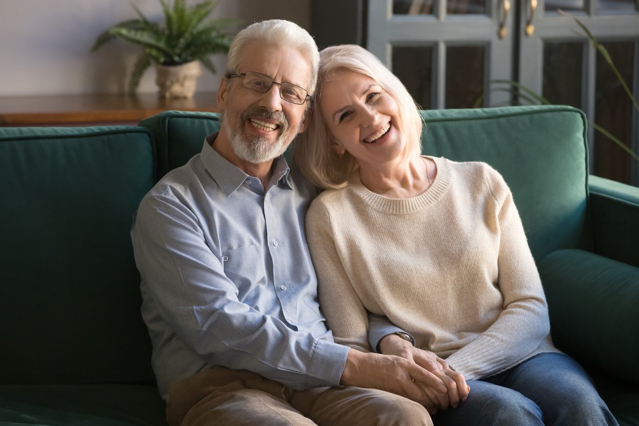 Healthy happy smiling elder family couple portrait.